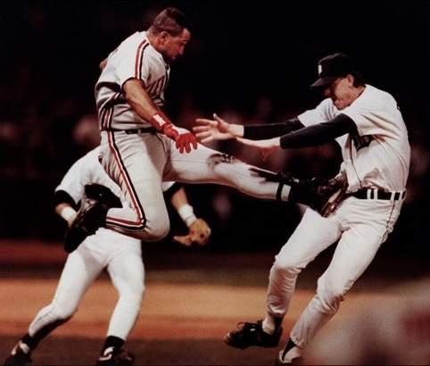 Photo of Sandy Alomar of the Indians kicking Detroit Tigers pitcher John Doherty in 1992. 