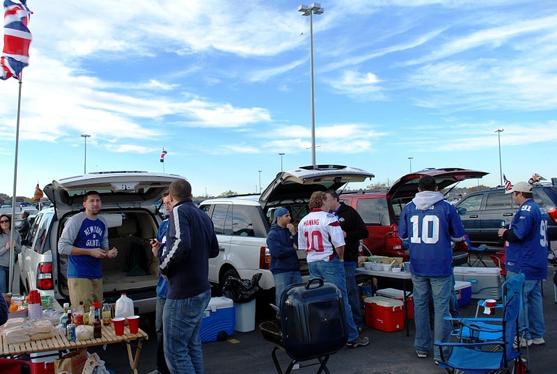 Photo of New York Giants fans tailgating outdoors.